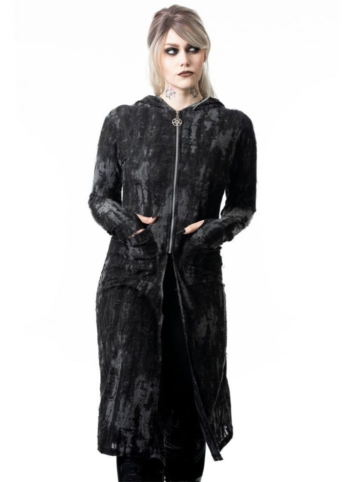 Woman wearing distressed cardigan
