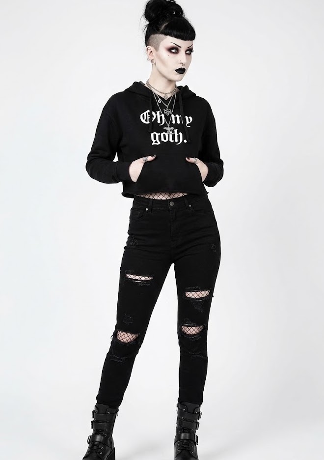 Woman in a gothic hoodie in black