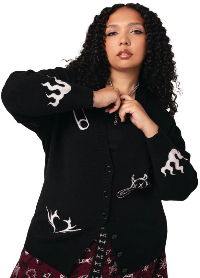 Woman wearing a black and white cardigan